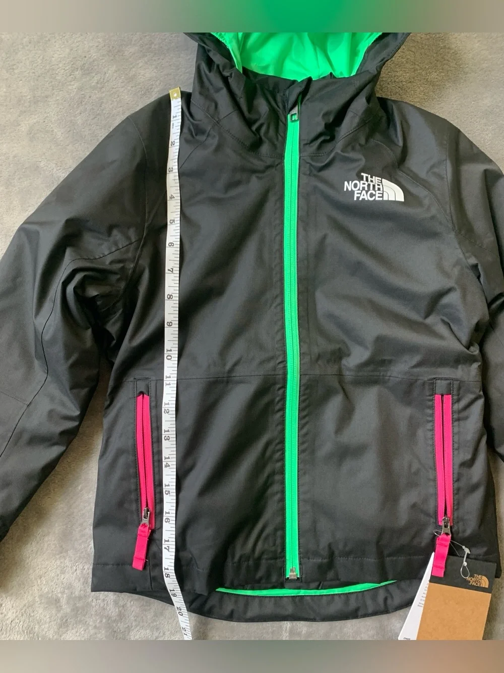 The North Face Black Hooded Jacket with Green Lining & Pink Zippers